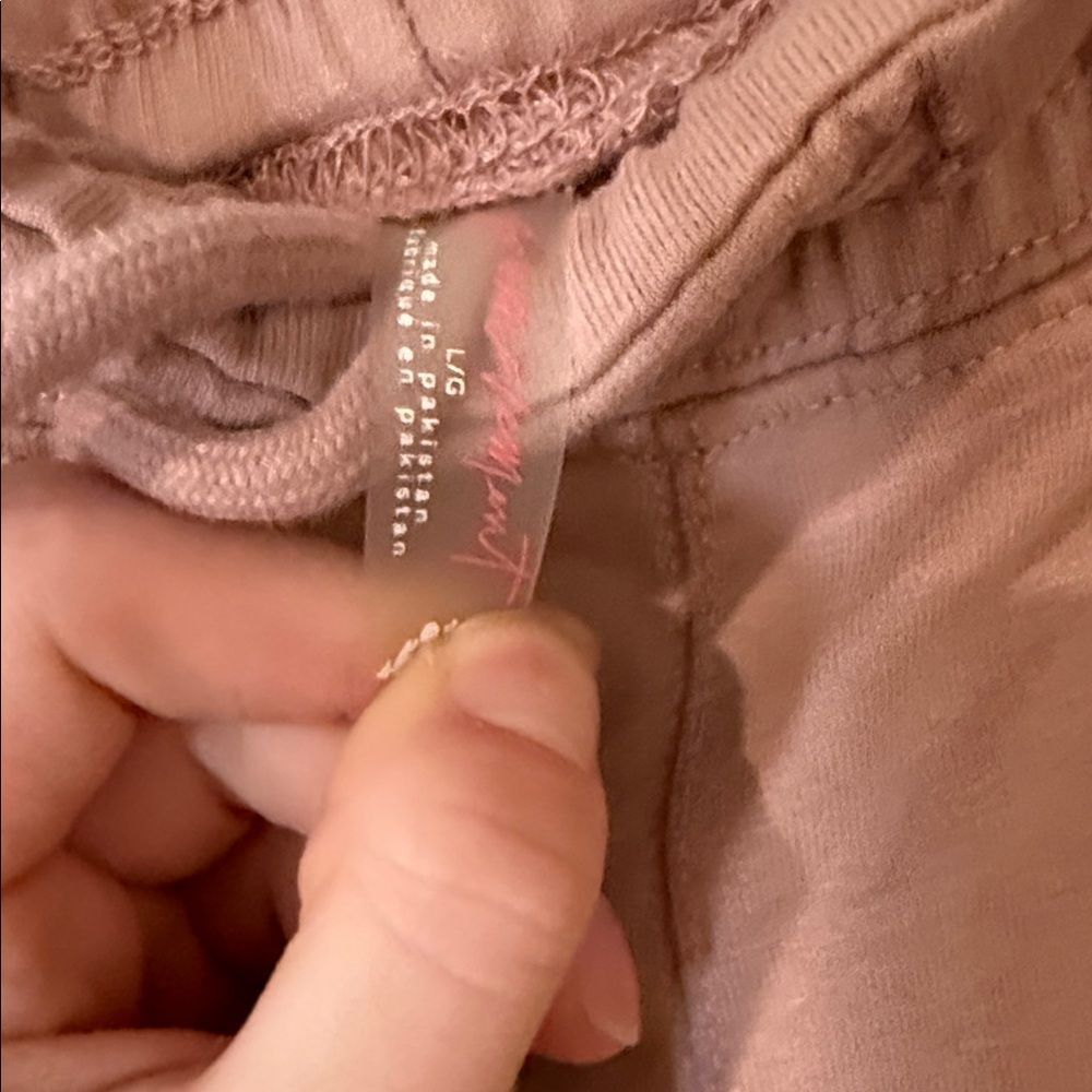 Free People movement dusty rose colored joggers with ankle zip and drawstring - Picture 12 of 13